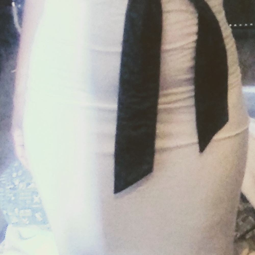 White floor length dress with or without sleeves